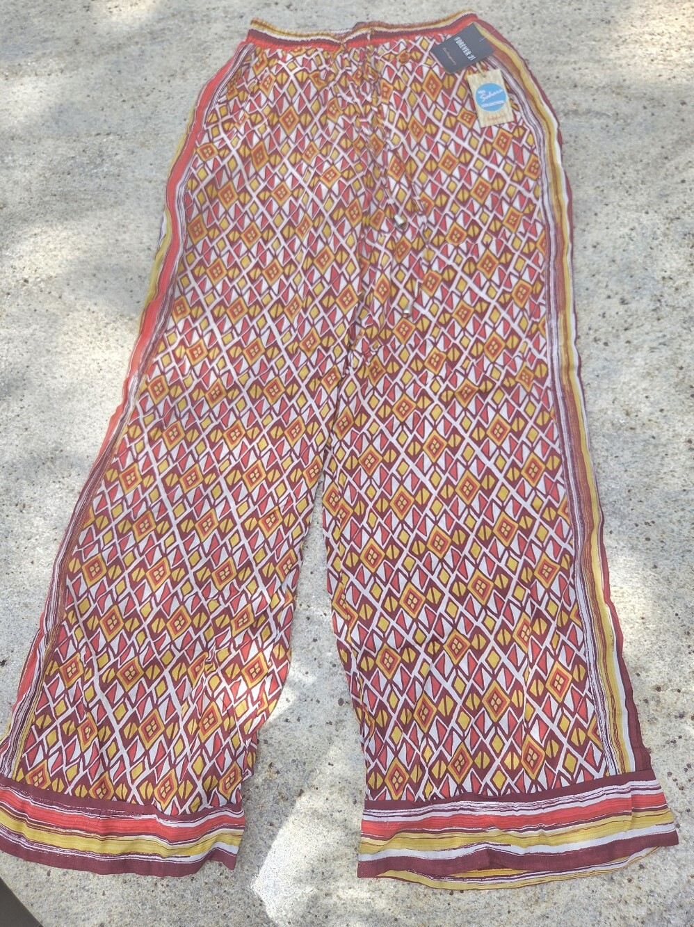 Forever 21 Contemporary palazzo pants featuring a red, white, and yellow diamond